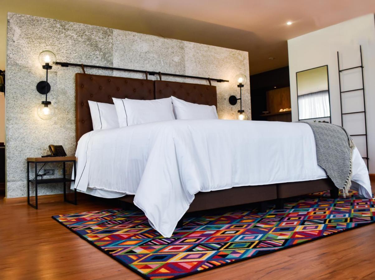 Hotel V1501 帕斯托 外观 照片 A bedroom with a carpet