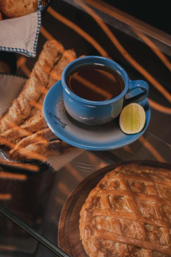 Hotel V1501 帕斯托 外观 照片 A cup of coffee with a slice of lime